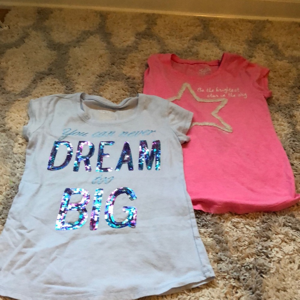 Two justice tee shirts